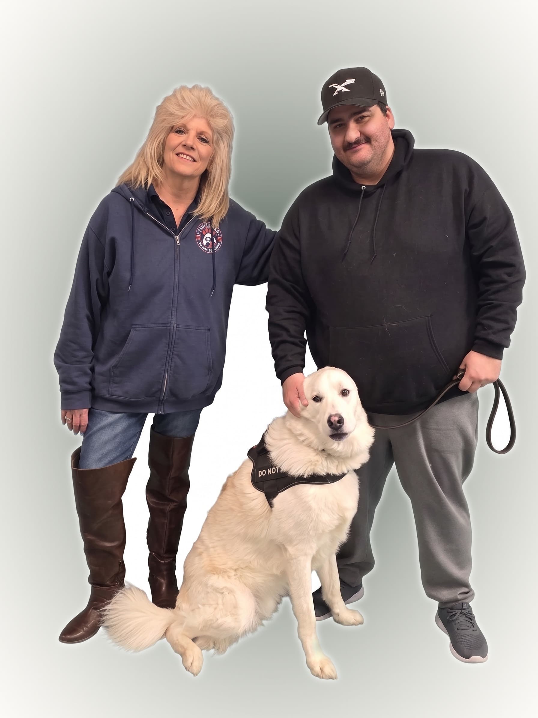 Professional dog trainer working with a golden retriever